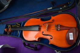 A Stentor student violin, hard case and unstamped bow