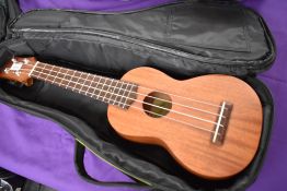 An Uluru Soprano Ukulele and gig bag, lovely tone and very clean condition
