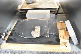 A hand built turntable and tone arm , comes with a solid wood plinth and a Cambridge Audio pre amp -