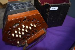A late 19th or early 20th Century 29 button concertina, labelled Lachenal , number 51299)