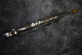 A Besson and Co Clarinet, stamped for London , number 3670, platework in need of some restoration,