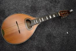 A Clifford Essex Mandolin , numbered M76749, believed to be by Marco Roccia, with historical