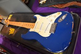 A Squier by Fender, Stratocaster, Korean made serial number 914533, in Fender Hardcase, case af with
