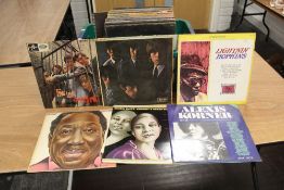 A large box of vinyl records - condition is vg - some are below this but there are some nice