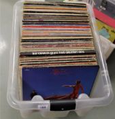 A large lot of 100 vinyl records - a mixed bag of many styles - may be good for online seller ,