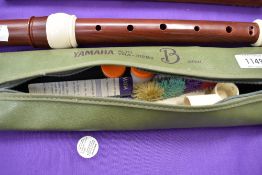 A vintage Alto recorder, plastic moulded body (rosewood effect) with case and accessories