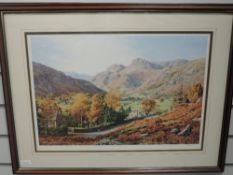 A print, after K Melling, Lakeland landscape, signed, 36 x 52cm, plus frame and glazed