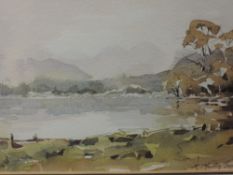 A watercolour, R Martin Tomlinson, Lake Windermere and the Langdales, signed, 15 x 24cm, plus
