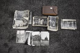 A collection of black and white photographs showing Royal visits to Mussleborough and an album of