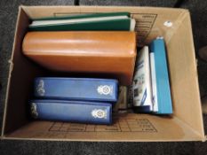 A box of GB & World stamps, used, along with empty albums and catalogues