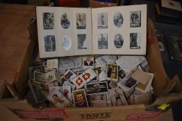 A box of Cigarette Cards including an Ogdens album of Tabs & Guinea Gold Cards