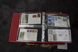 A box of GB First Day Covers, mainly 1960's, 70's and 80's, a box of Empty Stamp and Cover Albums