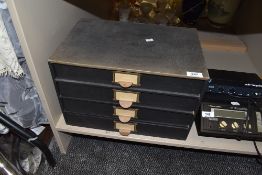 A vintage filing cabinet.