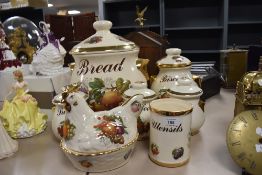 A selection of kitchen crockery including bread crock, biscuit barrel and more.