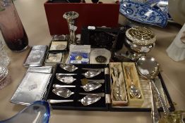 A selection of flatware and plated ware, cigarette cases,commemorative and similar coins also