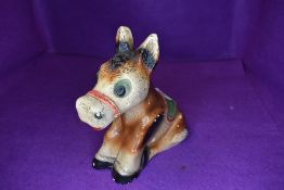 A vintage chalk ware donkey money box.