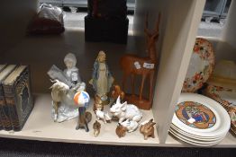 A selection of figurines and similar including wade seal with beach ball.