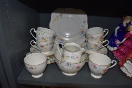 A part tea service having a hand decorated floral pattern by Royal Grafton bone china