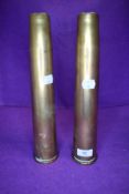 A pair of 40mm military ammunition shells dated 1942