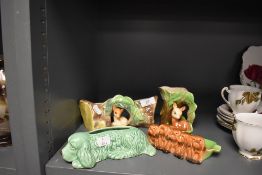 Four spill or posy vase have fauna and dog designs including green Sylvac dog