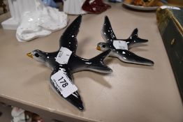 Two Beswick style wall plaques modelled as Swallows, different sizes