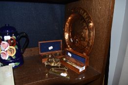 A selection of scientific devices including brass blood letting knife