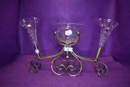 A Victorian table centre epergne having silver plated stand with etched glass wells in fine