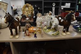 A selection of decorative figurines including two Beswick Shire Mare brown horses 818, nodding