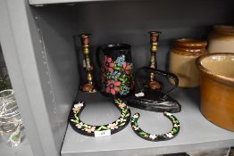 A selection of hand decorated canal barge ware including horse shoes and water jug