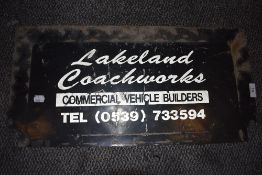A stencil style sign for Lakeland Coachworks Commercial Vehicle Builders