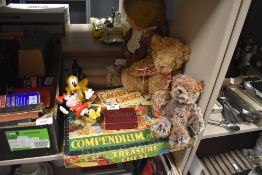 A vintage compendium of games,a Steiff bear, doll and similar.