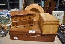 Three wooden jewellery boxes and a sycamore bowl.