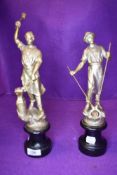a pair of mantle garniture figures for industry and commerce