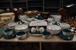 An assortment of Denby 'Greenwheat' including bowls, lidded serving dish,cups and saucers and more.