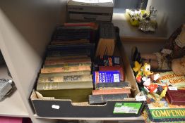 A box full of vintage and antique books including novels and Mrs Beetons family cookery.
