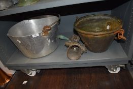 A selection of kitchen hardware including jam pan and mincer