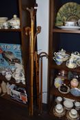 Eight walking sticks or shepherds crooks of various designs including horn handle, bamboo shafts and