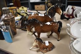 Three Beswick studies, Shire Mare 818 (af), Stock Jogging Mare, third version 855 (af) and Foal,