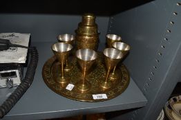 A middle eastern style cocktail set including tray six goblets and a mixer