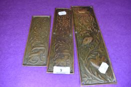 Three late Victorian arts and crafts door finger plates in a William Morris style design