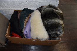 A mixed lot of ladies clothing including skirts, faux fur jackets and accessories brands such as