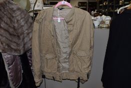 A gents retro beige jacket.