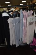 A collection of ladies evening dresses and occasional dresses, brands such as Coast and Debut,