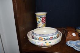 Three pieces of mid century design studio pottery by Poole a Vase a flower bowl and fruit bowl