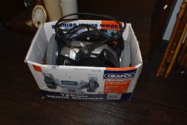 A modern workshop Draper bench grinder with box