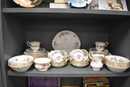 A fine part tea and dinner service by Royal Albert in the Lavender Rose design all pieces having