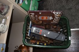 A variety of vintage woodworking planes a reproduction Brasso sign and a Raymarine ST1000.