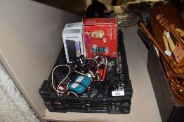 A box of mobile phones and accessories.
