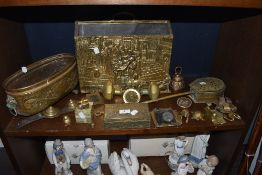 A selection of brass wares including magazine rack and arts and crafts planter