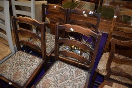 A set of mid 20th Century ladder back dining chairs